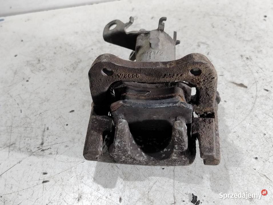 ZACISK HAMULCOWY PRAWY TYŁ RENAULT SCENIC III 15