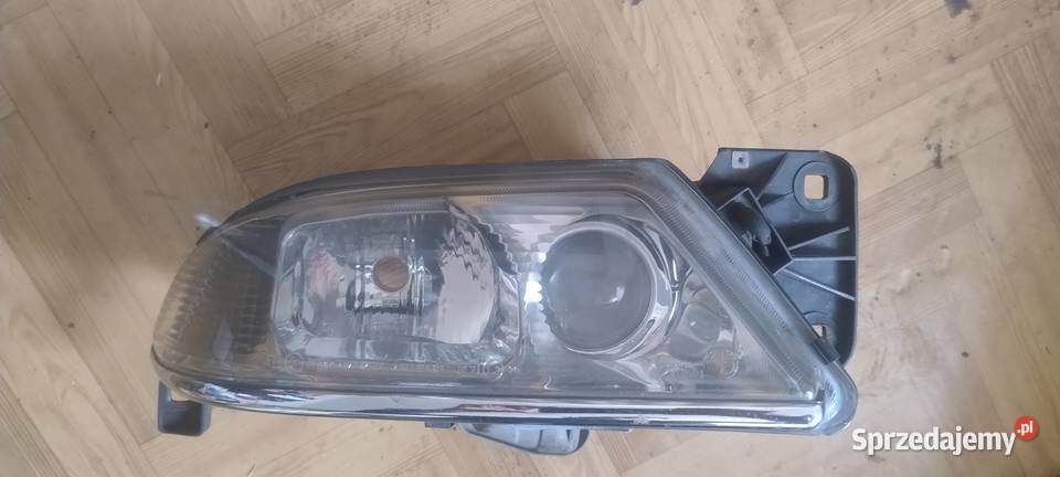 Reflektor prawy lampa Alfa Romeo 166 982003 Radom