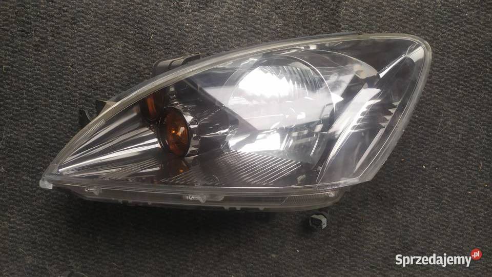 Mitsubishi Lancer 2003 2006 lampa lewa ciemna lampy przednie Byków