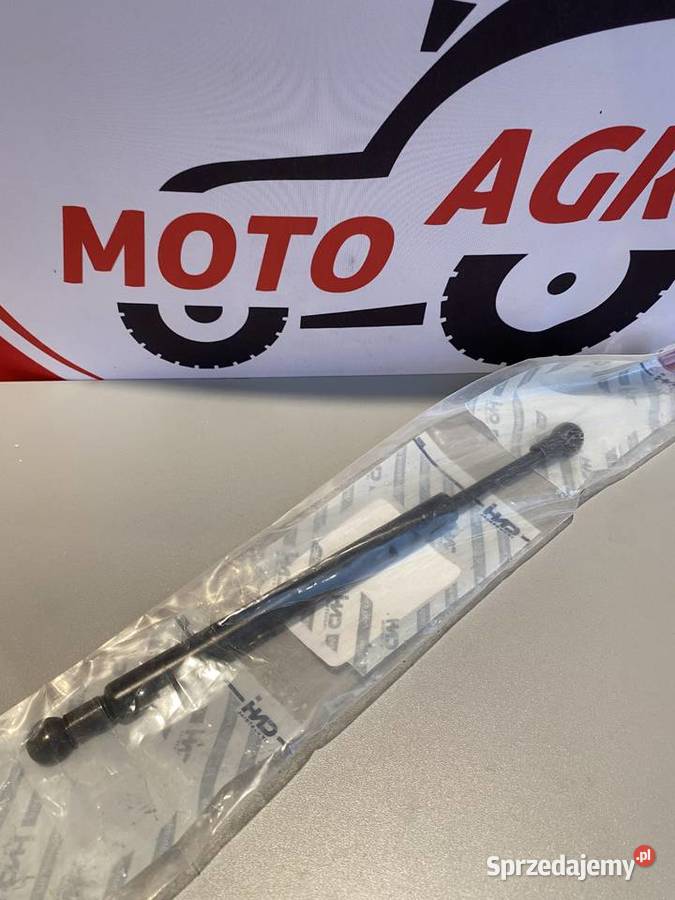 Siłownik gazowy drzwi Case Holland Steyr