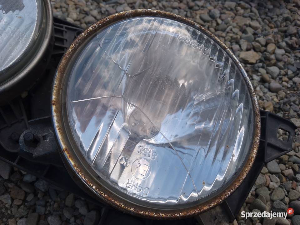 Lampa lewa przednia przód BMW E34 Oświetlenie Radłów