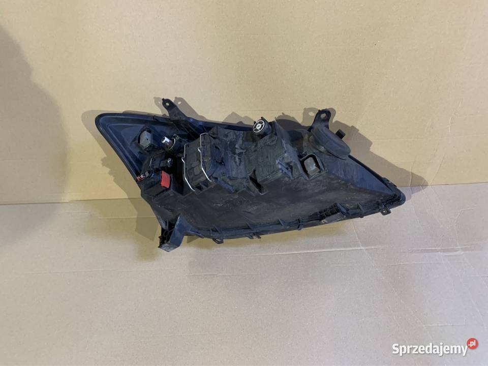 8611002100 reflektor lampa przód lewa toyota Szczecin