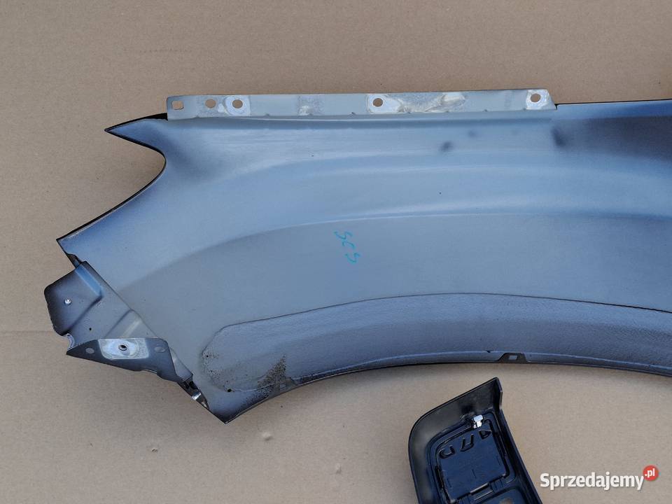 DACIA DUSTER II BŁOTNIK PRAWY PRZÓD LISTWA Części samochodowe Bieleń