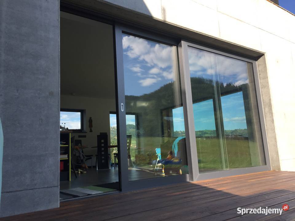 Okna aluminiowe Schco z ukrytym skrzydłem AWS Nowy Sącz