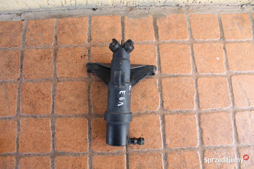 SPRYSKIWACZ LAMPY LEWY BMW E61