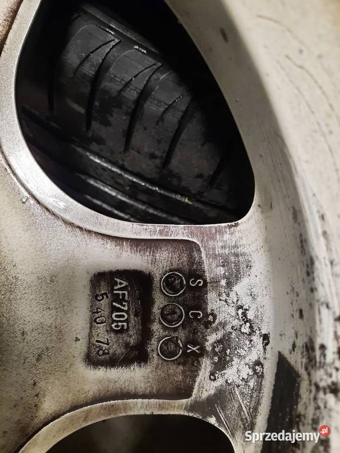Felgi aluminiowe z oponami 15 mazda