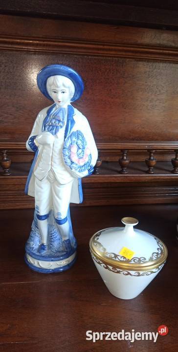 Figurka młodzieńca z koszykiem owoców Bez Gdańsk