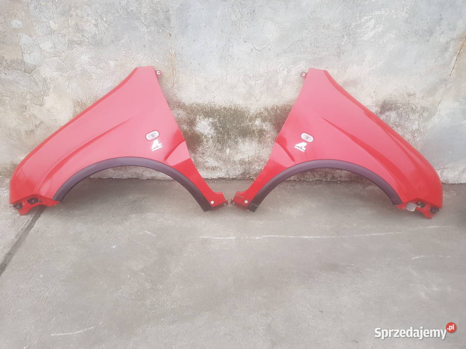 Suzuki Ignis MH 0410 błotnik przód przedni Legnica