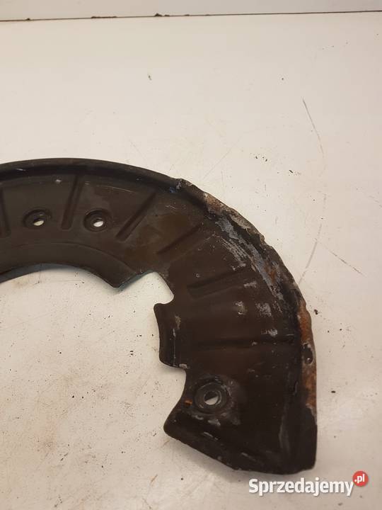 OSŁONA TARCZY LEWY PRZÓD AUDI Q7 7L0615311B Przystajń