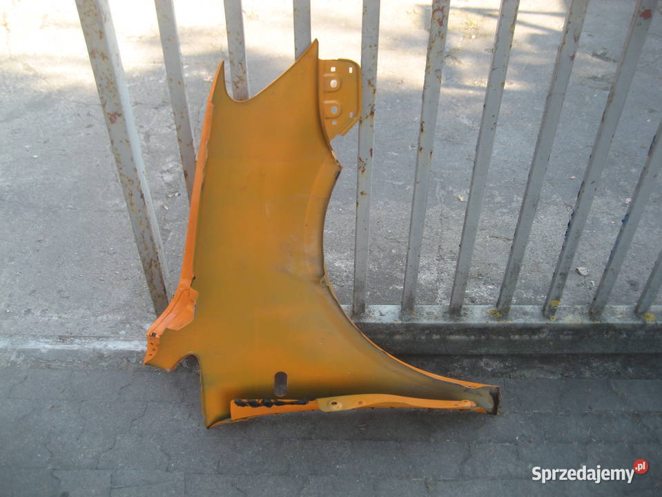 vw caddy III lift 1015r błotnik przód lewy tong