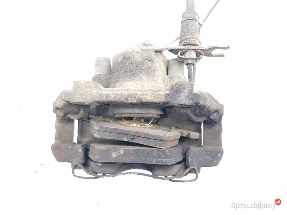 ZACISK HAMULCOWY PRZÓD LEWY VOLKSWAGEN PASSAT B5 osobowe Lipno