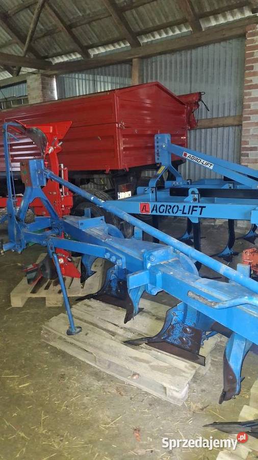 Pług rabe werk 4 skibowy z przedpłużkami 31 Janówka Wschodnia