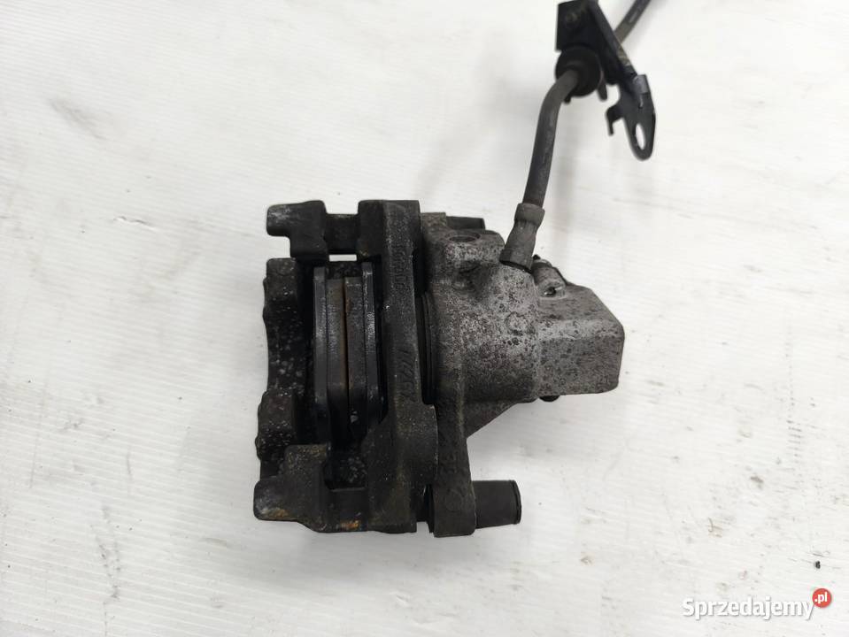 ZACISK PRAWY TYŁ FORD FOCUS MK3 LIFT KOMBI wielkopolskie sprzedam