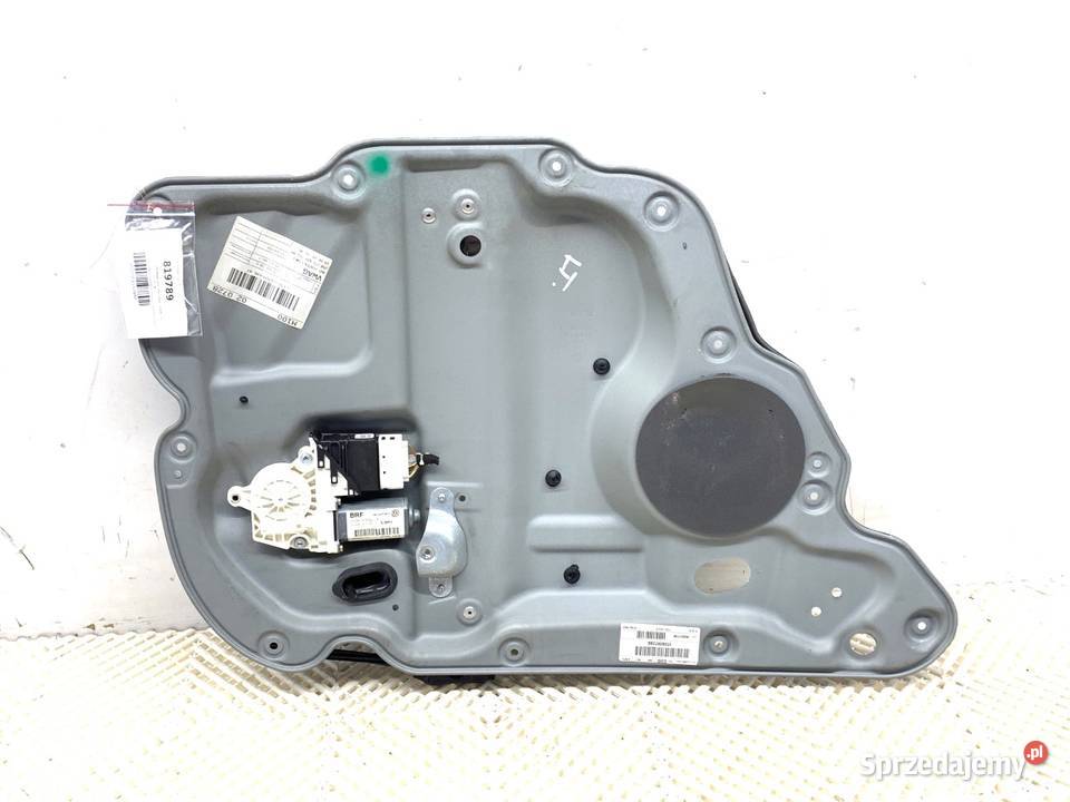 PODNOŚNIK SZYBY LEWY TYŁ VW TOURAN 1K0959703B