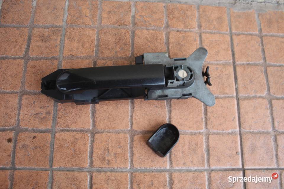 KLAMKA DRZWI LEWY PRZÓD Z11 NISSAN NOTE E11