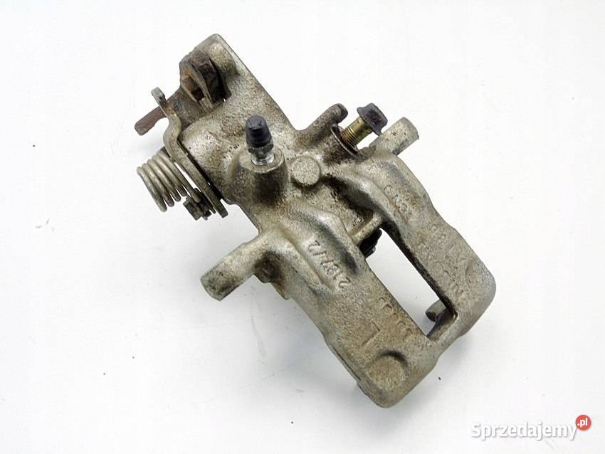 ZACISK HAMULCOWY LEWY TYŁ NISSAN ALMERA TINO śląskie Sosnowiec