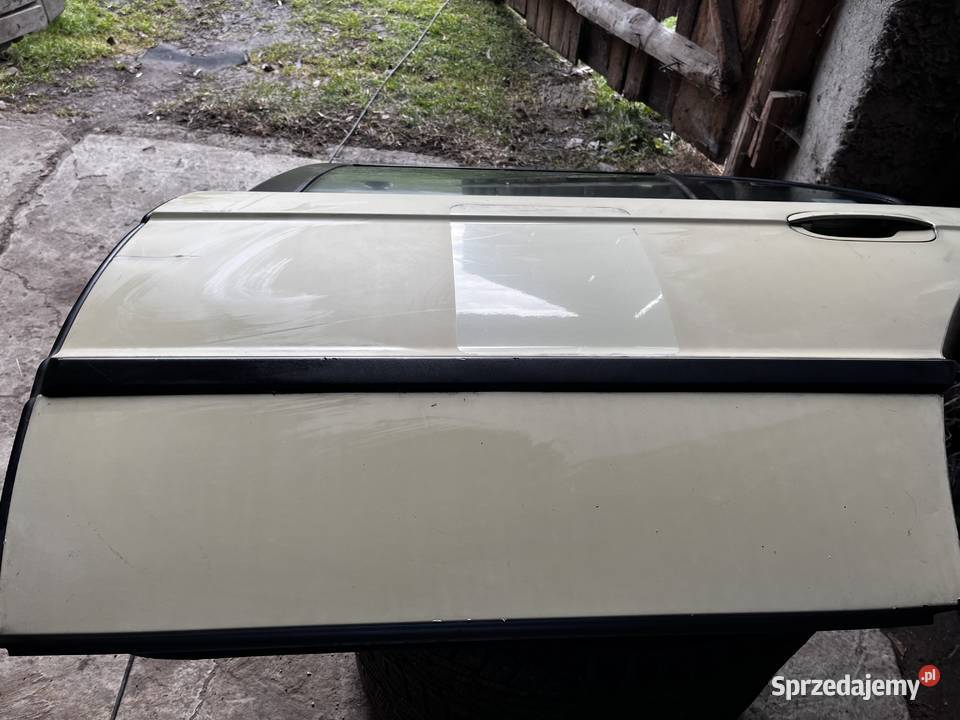 DRZWI LEWY TYŁ BMW E38 ZDROWE osobowe
