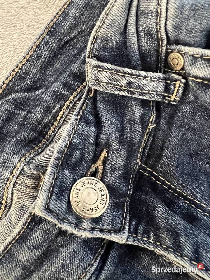 Jeansy dżinsy spodnie jeansowe niebieskie z Spodnie Jasło sprzedam