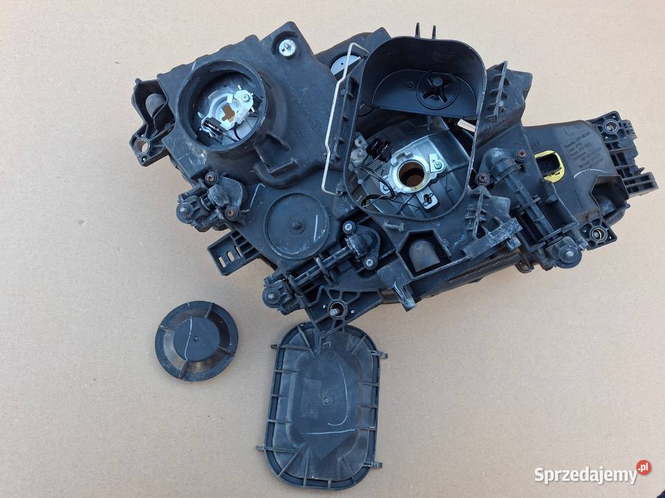 MECEDES ACTROS MP4 REFLEKTOR PRAWY ORYGINALNY Bieleń