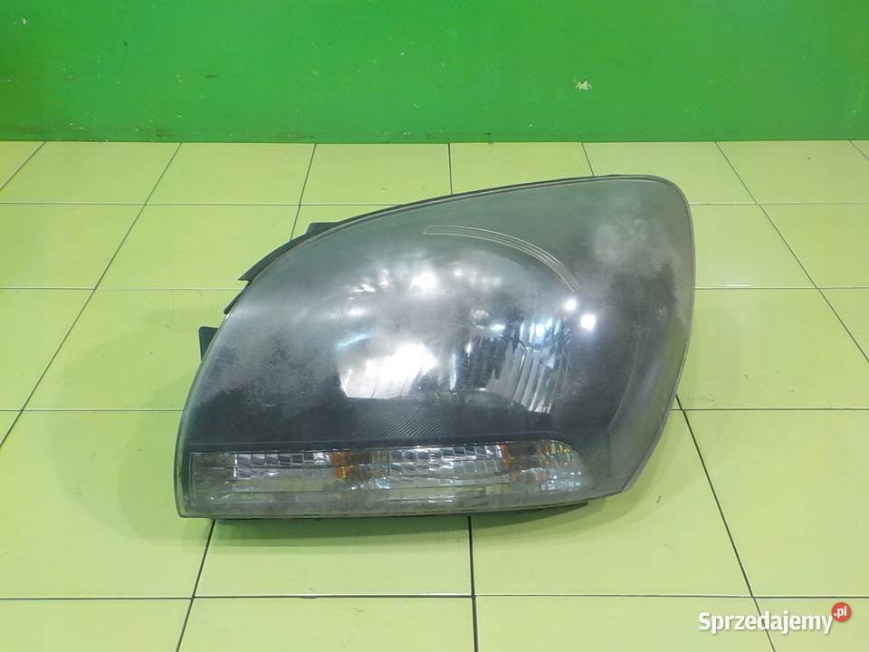KIA SPORTAGE II 20 CRDI 07r 5D lampa lewa przod Suków