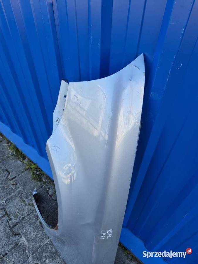 BŁOTNIK PRZÓD LEWY VW PASSAT B5 FL LA7W SREBRNY