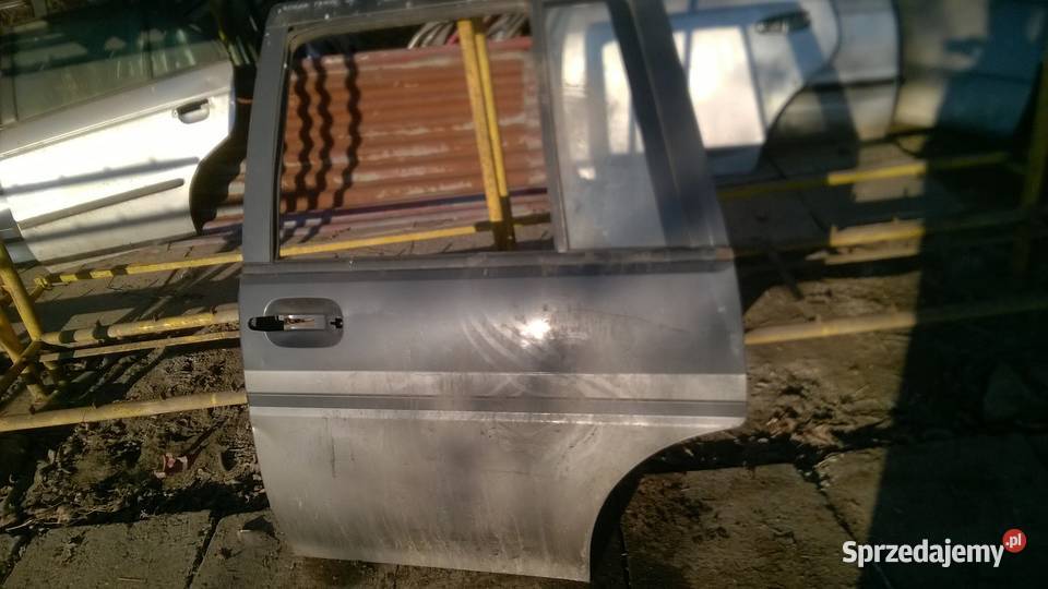 NISSAN PRAIRE PRAIRIE drzwi lewe tył Wrocław sprzedam