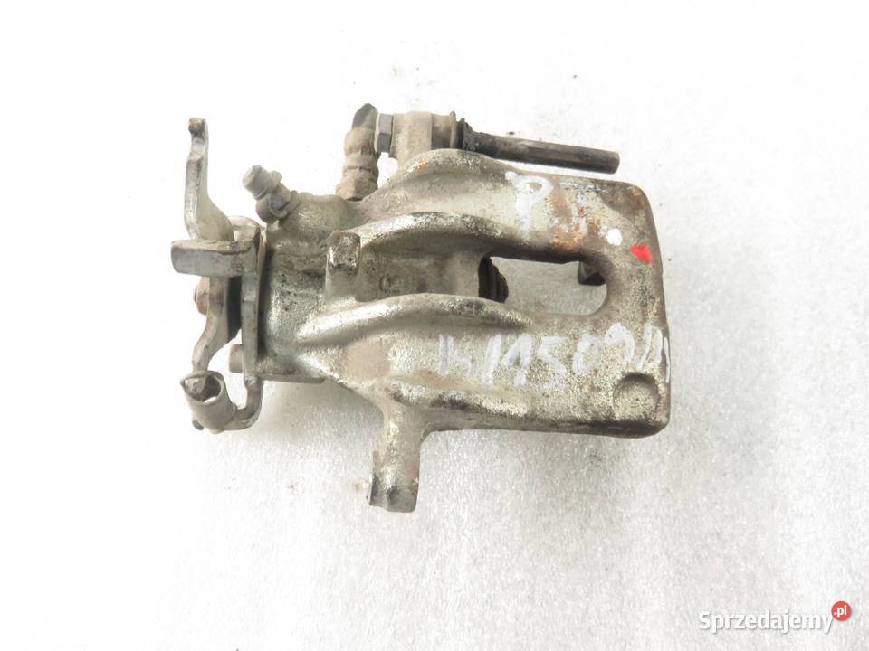 ZACISK PRAWY TYŁ FORD FOCUS MK1 I 18 TDDi 90