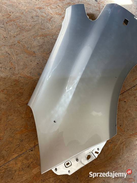 Opel Corsa D 0614 Błotnik lewy Z157 Części