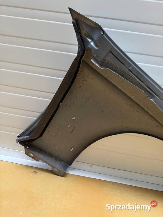 Mercedes CLS C219 0410r PRZEDNI BŁOTNIK LEWY Błotniki Rudka