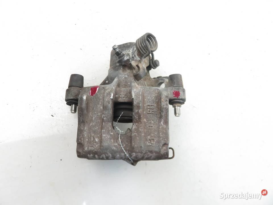 ZACISK PRAWY TYŁ MAZDA 3 sedan