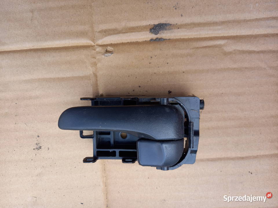 Klamka wewnętrzna drzwi przód lewa Nissan Almera