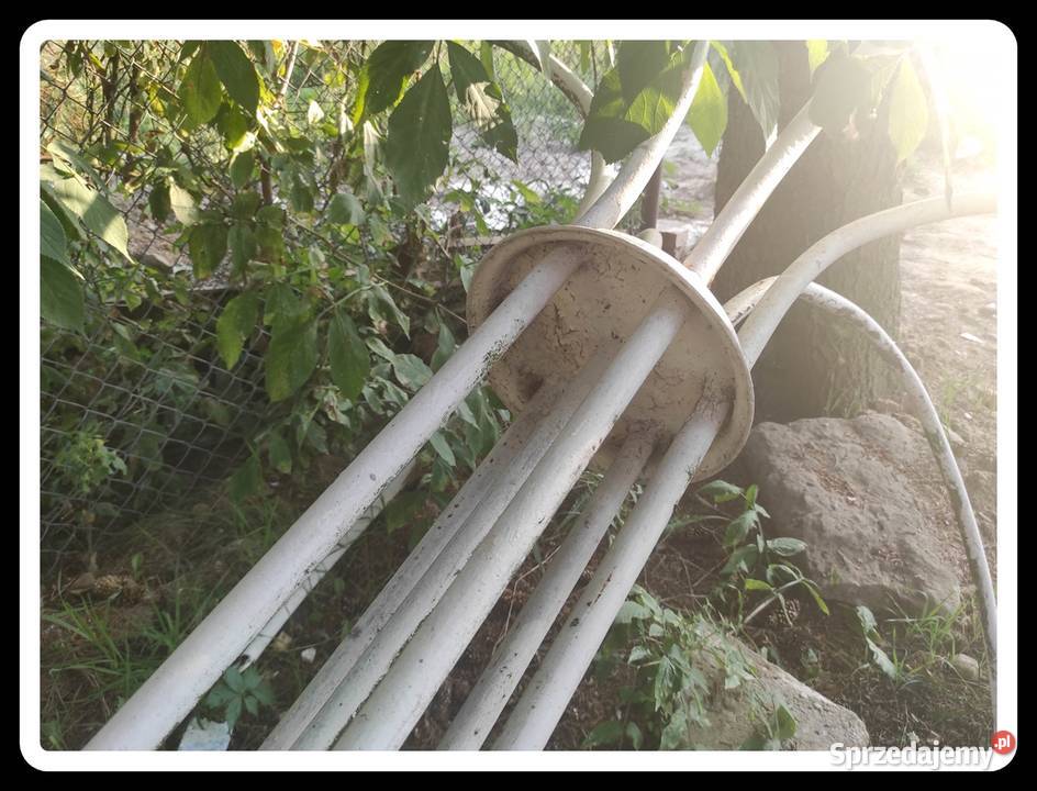 Wysoki metalowy ciężki kwietnik na wiszące biały Płock