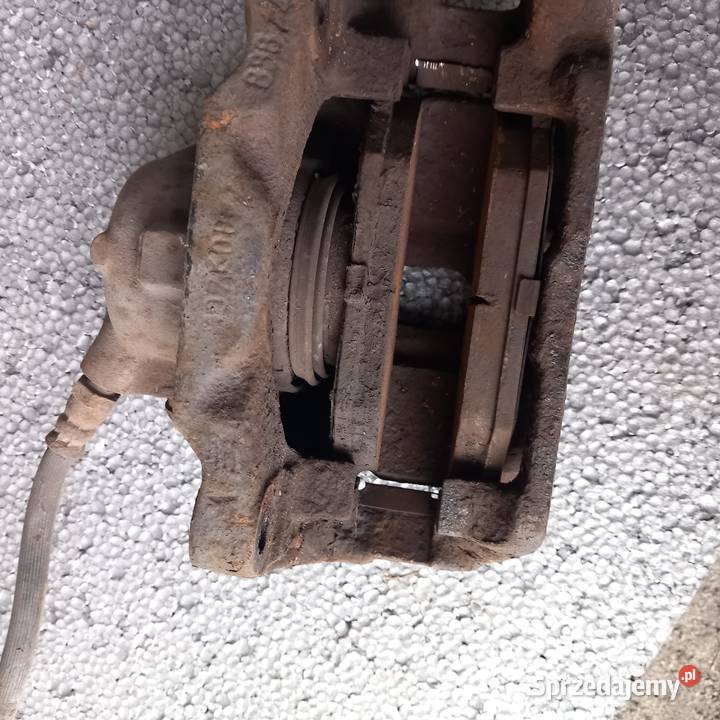 Lewy zacisk przód do Renault Scenic I Lift 19