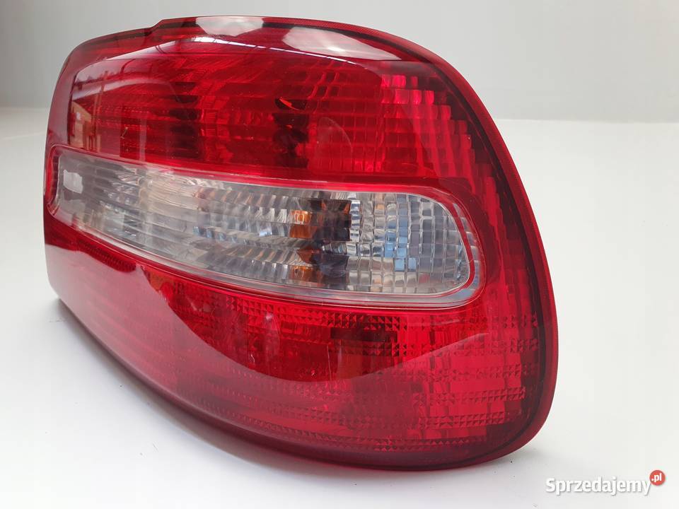 LAMPA PRAWA Volvo S40 I lift 9904r TYLNA prawy Rudka
