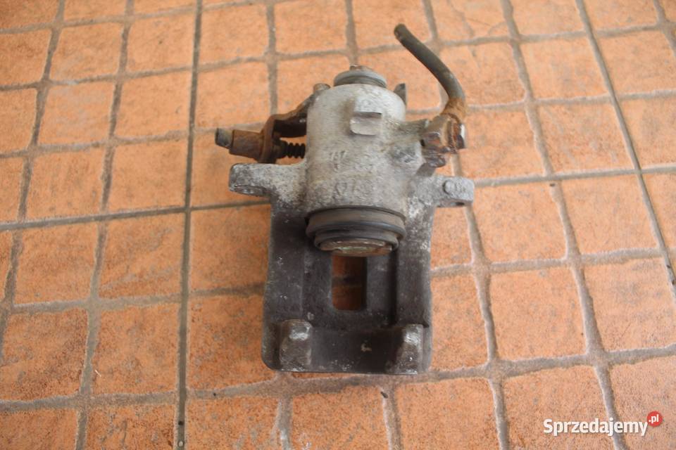 ZACISK HAMULCOWY LEWY TYŁ AUDI A4 B6 25 TDI osobowe