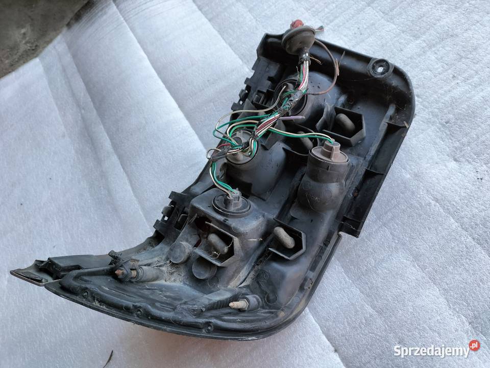 LAMPA TYŁ TYLNA TOYOTA COROLLA E10 LEWA Kamień-Kolonia