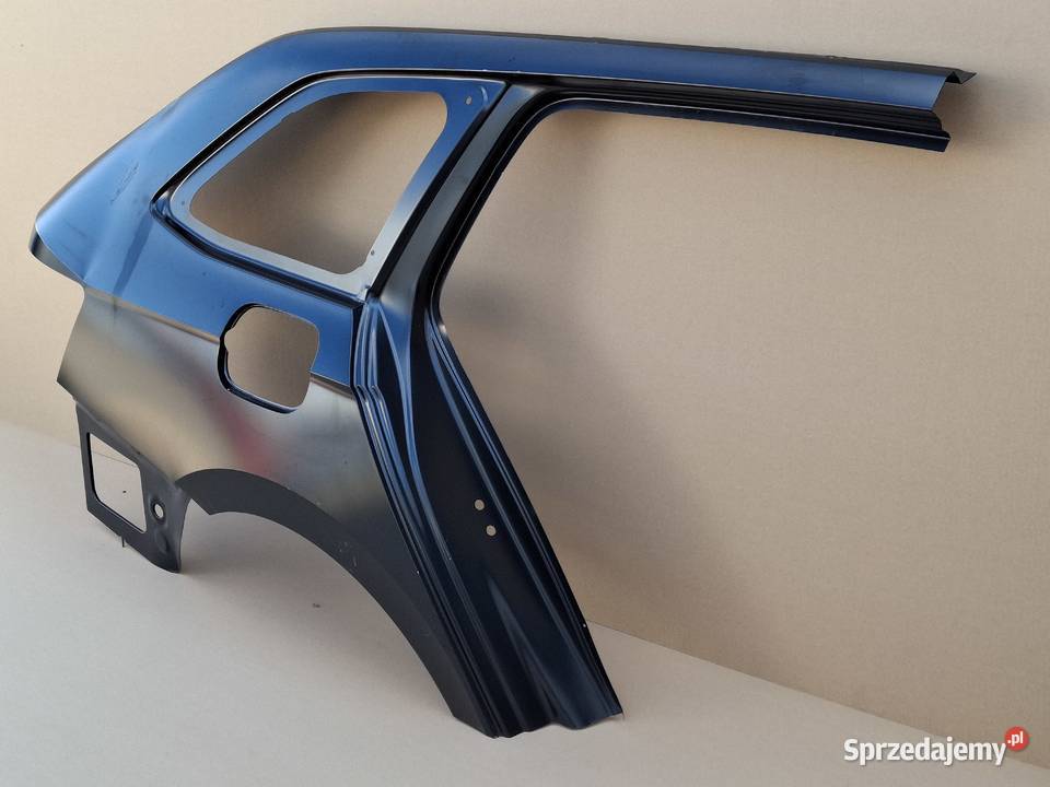 SKODA SUPERB III 3 KOMBI BŁOTNIK PRAWY TYŁ Bieleń