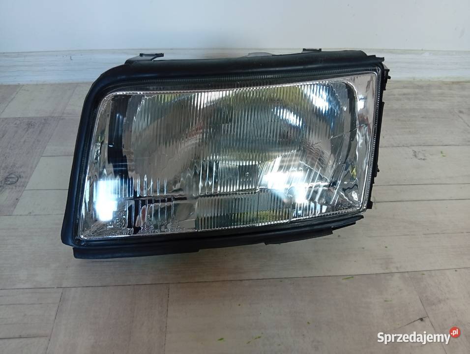Audi 100 C4 9094 reflektor przedni lampa osobowe Łódź
