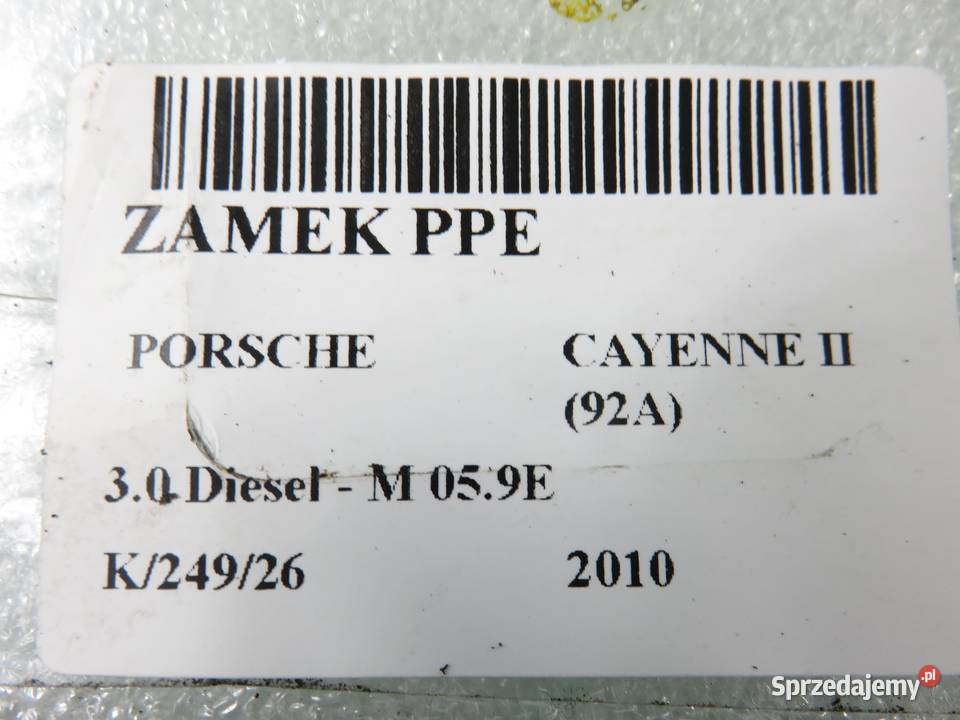 ZAMEK PRAWY PRZEDNI PORSCHE CAYENNE II 92A