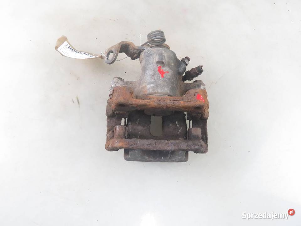 ZACISK LEWY TYŁ OPEL ASTRA III H 13 CDTI osobowe