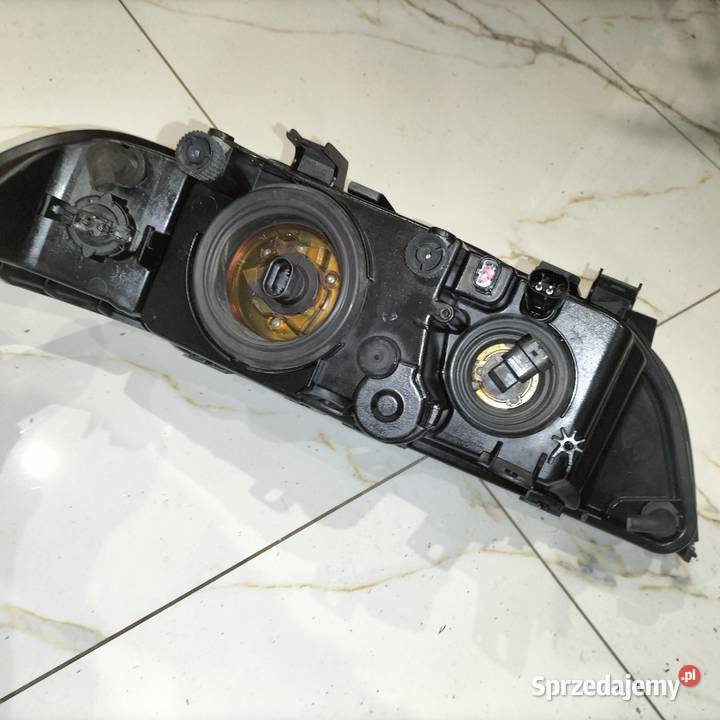 Lampy przednie BMW E39 Oryginał BMW HELLA stan Poręba