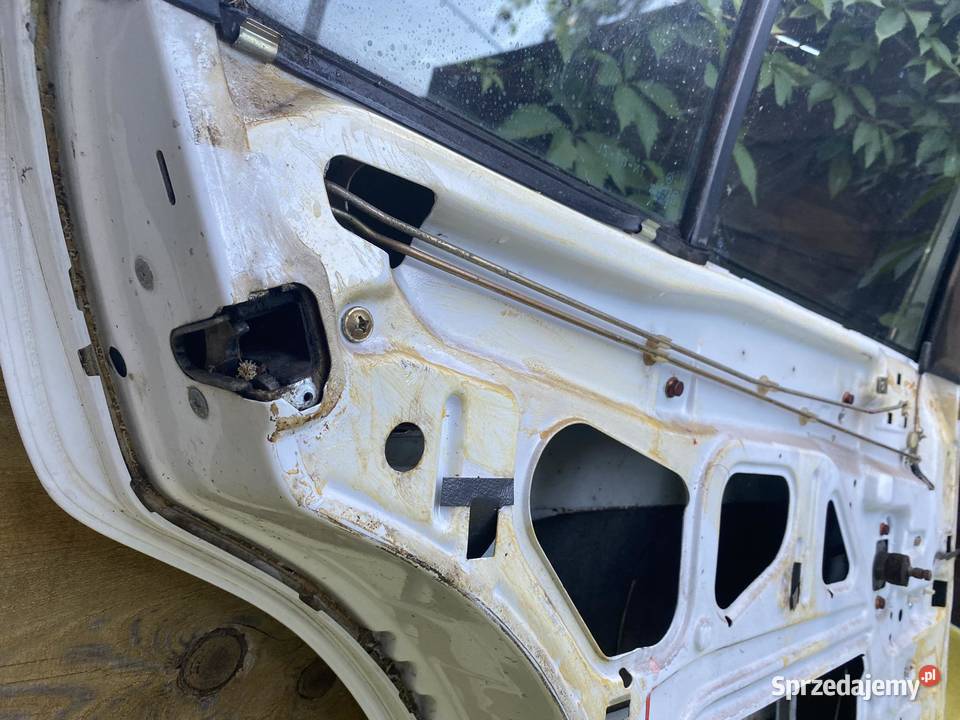 MercedesBenz E W124 Drzwi lewy tył Łagiewniki