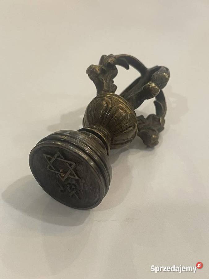 Zabytkowy mosiężny stempel z Gwiazdą Dawida i małopolskie Kraków