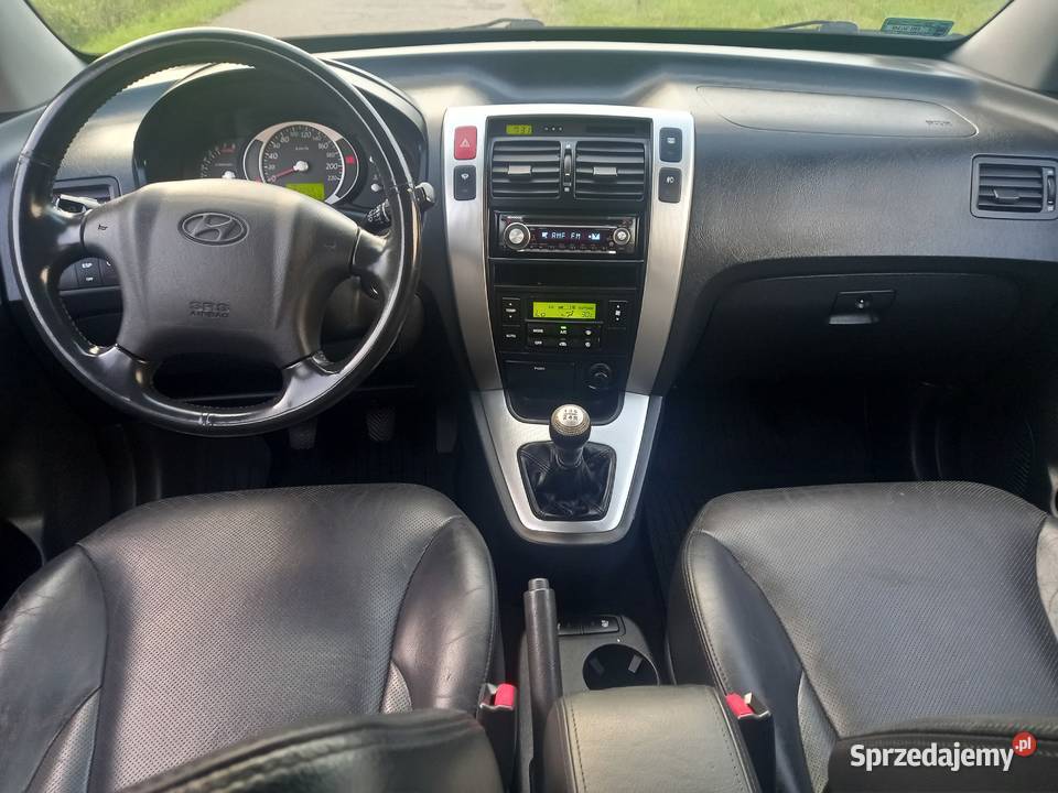 Hyundai Tucson 20 benzynaUtrzymanyBezwypadkowy lakier metallic Mniów