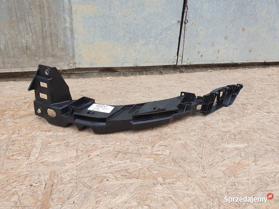 VW POLO V 6R ŚLIZG LEWY POD LAMPĘ PRZÓD Międzychód