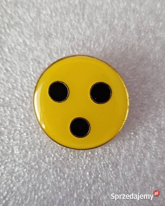 3 żółte przypinkipiny