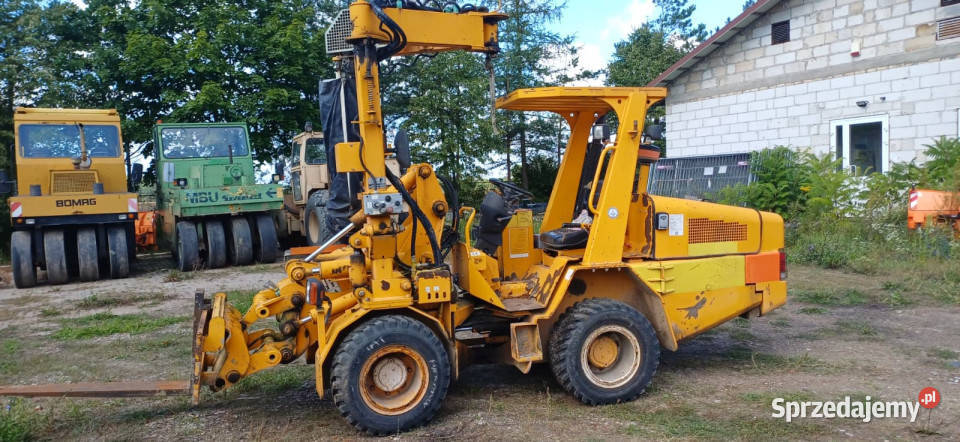 Ładowarka TRANSMANUT ETP 2004 4x4 z układarką do Rok produkcji 2000 Izabelin sprzedam