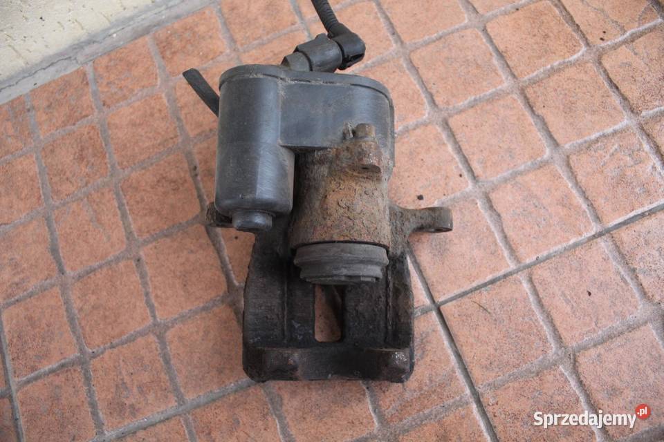 ZACISK HAMULCOWY LEWY TYŁ VW PASSAT B6 20 TDI wielkopolskie