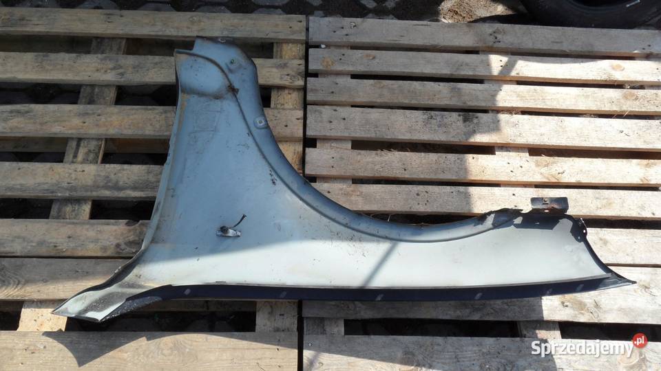 BMW X3 E83 LIFT 06r błotnik prawy przód