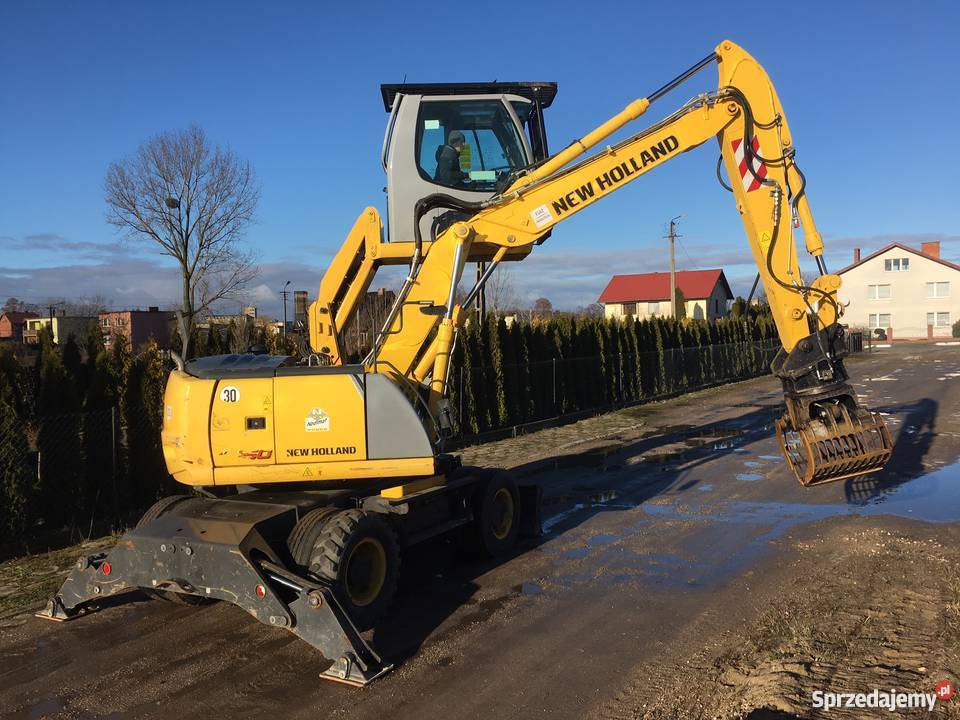 Koparka kołowa NewHolland 150 podnoszona kabina Maszyny budowlane Janikowo